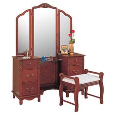 a wooden dressing table with mirror and stool