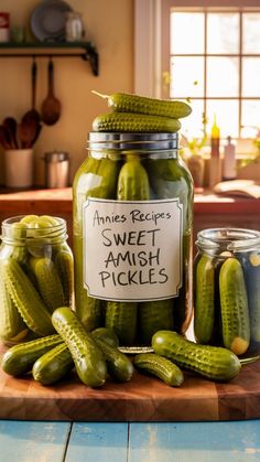 pickles in jars with labels on them sitting on a table