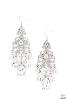 Gradually increasing in size, glassy white teardrop gems create a dramatic fringe at the bottom of a decorative silver frame swirling with dainty white rhinestones for a timelessly over-the-top sparkle. Earring attaches to a standard fishhook fitting. Sold as one pair of earrings. P5RE-WTXX-485XX Paparazzi Accessories Jewelry, Dream Prom, Bling Earrings, 25 21, Sparkly Earrings, White Outfit, Fish Hook Earrings, Dress Inspo, Paparazzi Accessories