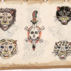 an old piece of paper with some drawings on it, including cats and skulls in different colors