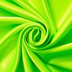 a close up view of a bright green fabric