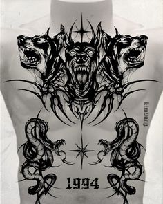 the back of a man's shirt with tattoos on his chest and two wolf heads