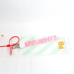 a pair of scissors sitting on top of a piece of paper with the word bewhit