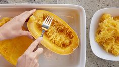 a person is cutting spaghetti in half on a plate with a knife and fork next to the dish