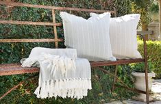 Made of hand-loomed cotton with interwoven pinstripes and fluffy tassels, this throw is delightfully soft, blissfully cozy, and wonderfully stylish. Loom, Tassels