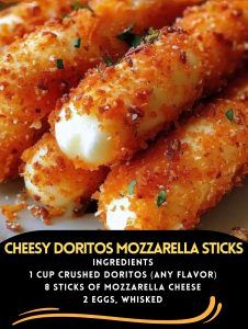 some food is on a white plate and there are other foods in the background that include cheeses, mozzarella sticks, and creme