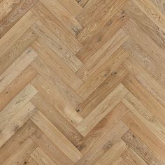 an image of wood flooring that looks like herringbones