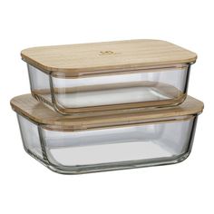 two glass casserole dishes with wooden lids