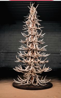 an antler christmas tree made out of fake antlers