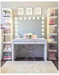 a white desk topped with a mirror and lights