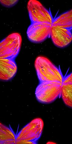 several colorful butterflies flying through the air with stars in the sky behind them on a black background