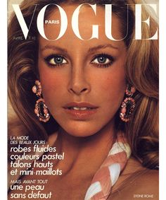 a magazine cover with an image of a woman wearing earrings on the front and back of her face