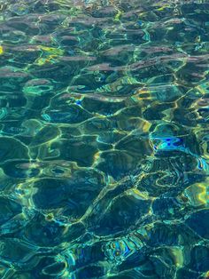 the water is very clear and blue with some ripples on it's surface