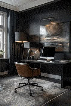 a desk with a laptop on it in front of a window and a lamp next to it