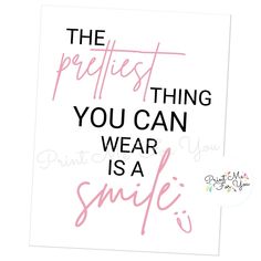 the prettiest thing you can wear is a smile on white paper with pink ink