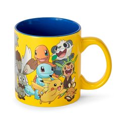 a yellow and blue coffee mug with pokemon characters on it