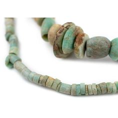 Admire this beautiful strand of pastel-toned Amazonite Stone Beads from Mali West Africa. Beads such as these have been prized for their unique color since Neolithic times. While the exact age of the Amazonite beads is not precisely known, similar beads from both Mauritania and Mali have been dated to more than 2000+ years old. Look carefully and you will see the unique handmade character of these stone beads. This is an exceptional one-of-a-kind piece suitable for bead collectors and bead afici Amazonite Stone, West Africa, Green Bead, Jewelry Making Beads, Unique Colors, Stone Beads, Beaded Jewelry, Sewing Crafts, Jewelry Making