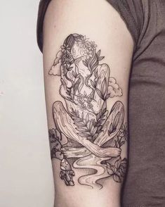 a woman's arm with a tattoo on it