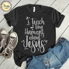 I Teach Tiny Humans About Jesus - Teacher Shirts - Sunday School Gifts, Pastor Gift, Faith Based Tshirts, Church Shirt, Homeschool Mom Shirt This creative original design is printed on the finest quality Bella+Canvas unisex t-shirt and is everything you've dreamed of and more! Flattering and comfortable for both men and women, it feels soft and lightweight with the perfect amount of stretch. Fit for any occasion, our premium shirts make the perfect gift. ♦ Hoodies, sweatshirts, v-necks and youth I Teach Tiny Humans, Dachshund Shirt, Church Shirt, Gifts For Pastors, Nerd Shirts, About Jesus, Dachshund Gifts, Faith Shirt, Homeschool Mom