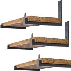 two wooden shelves with metal brackets on them