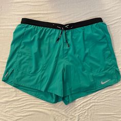 Brand New Nike Standard Fit 5” Length Green Running Shorts Pocket In Back Of Shorts Shorts On Gray On My Page As Well Green Short Activewear For Running, Green Short Activewear For Outdoor, Green Short Outdoor Activewear, Green Training Shorts With Elastic Waistband, Green Go-dry Shorts For Training, Green Go-dry Shorts For Gym, Green Go-dry Gym Shorts, Green Short Activewear With Pockets, Green Stretch Swim Trunks With Go-dry