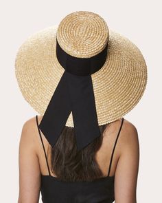 Crafted from natural straw, this chic sun hat features an extra-wide brim and an oversized bow at the back. 100% straw Bow: 100% polyester Spot clean Made in the USA | Eugenia Kim Women's Mirabel Sun Hat in Natural | Polyester Eugenia Kim, Sun Hat, Personal Shopping, Wide Brimmed, Sun Hats, Made In The Usa, Floppy Hat, The Back, Straw