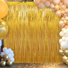 balloons and streamers decorate the backdrop for a party