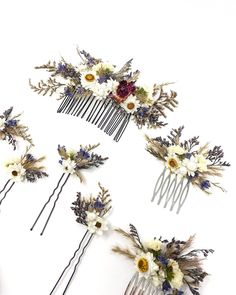 four hair combs with flowers and leaves on them