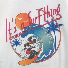 it's a surf thing t - shirt with an image of a surfer riding a wave