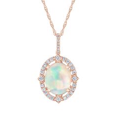 Inspired by the watercolor artistry of REEDS matriarch and co-founder, Roberta Zimmer, the exclusive Roberta Z Watercolor Collection is awash in soft hues and luminous detail. In this collection, we celebrate her spirit and the grace and fortitude of women everywhere. Crafted in precious 14k rose gold, this pendant features an impressive 12x10mm oval-shaped opal gemstone that shimmers with its characteristic play-of-color. Sparkling round diamonds frame the opal gemstone in a halo silhouette and Rose Gold Pendant Necklace, Watercolor Collection, Diamond Frame, Rose Gold Pendant, The Grace, Gold Pendant Necklace, Opal Gemstone, Rope Chain, Gold Pendant