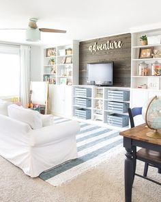 the living room is clean and ready to be used as a den or playroom