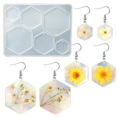 six honeycombs with flowers in them next to an ice tray