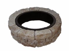 a stone fire pit with a black ring around it's center and bottom section