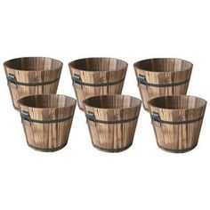 four wooden buckets sitting next to each other