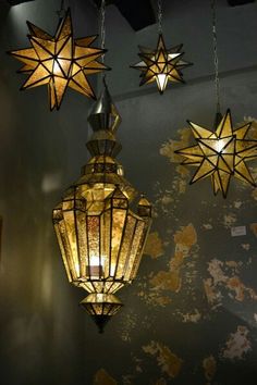 five hanging lights in the shape of stars