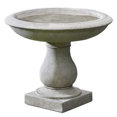 a stone pedestal with a bowl on it's base, isolated against a white background