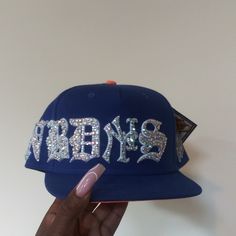 Custom Mix Size Full Bling Out Crystal Famous Nobody's Old English Embroidery Snapback Hat. Super Detail. 2 Other Colors Also Available, Hats Are Made To Order (This One Is Ready To Ship), Please Allow 2 Weeks To Ship For Custom Orders. Personal Hat, I Wasn't Looking To Sell But Only Willing To Sale For Asking Price. Price Includes The Cost Of This Limited Edition Twenty Two X Famous Nobody Hat (X Marks The Spot). Video Taken Without Flash. These Pics Doesn't Do This Hat Any Justice. 90’s Hats, Cool Fitted Hats, Custom Fitted Hat, Fitted Hats Women, Custom Snapbacks, Bedazzled Hat, Customized Hats, Rhinestone Hat, English Embroidery