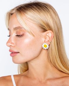 OFFICIAL COLLABORATION WITH SMILEY® Everything is better with a smile. Don't you feel the same? Keep the vibes happy in these adorable daisy smiley earrings! Details: 14k gold plated zinc studs 1 inch width The earring post is made of surgical steel Set of 2 studs final sale Trendy Daisy-shaped Spring Jewelry, Trendy Smiley Face Jewelry For Summer, Everyday Daisy Earrings, Trendy Everyday Flower Earrings, Everyday Daisy-shaped Jewelry For Spring, Everyday Daisy-shaped Spring Jewelry, Trendy Hypoallergenic Flower Earrings For Spring, Daisy Shaped Earrings For Summer, Daisy-shaped Earrings For Summer