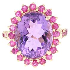 This ring has a Amethyst that weighs 9.49 carats and has 28 Pink Sapphires that weigh 1.37 carats. The total carat weight of the ring is 10.86 carats. The ring is crafted in 14 Karat Yellow Gold and weighs approximately 5.9 grams. The ring is a size 7 and can be re-sized at no additional charge. Jewellery Rings, Pink Men, Women Diamond, Yellow Gold Ring, Diamond Gemstone, Pink Sapphire, Yellow Gold Rings, Jewelry Vintage, Cocktail Rings