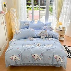 a bed room with a neatly made bed and two stuffed animals on the pillow cases