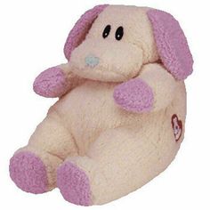 a pink stuffed animal sitting on top of a white floor