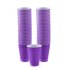 purple plastic cups are stacked on top of each other