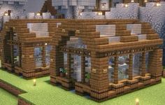 an image of a small house made out of wood and stone in the middle of a minecraft village