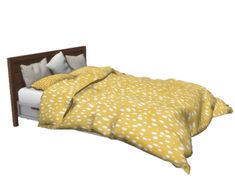 a bed with yellow and white polka dots on the comforter, pillows and pillowcases