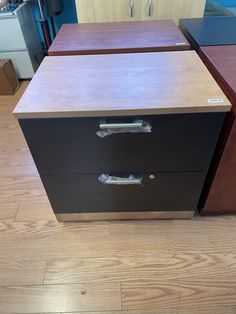 two drawers are open on the floor next to each other