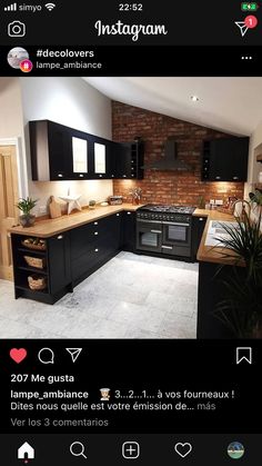 an instagram page with black cabinets and white tile flooring in the kitchen area