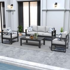 a living room with couches and tables next to a pool