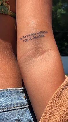 two women with tattoos that say everything matters for a reason