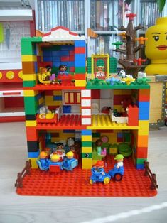 there is a toy store with legos on the shelves