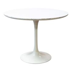 an image of a white table on a white background that looks like it is made out of concrete